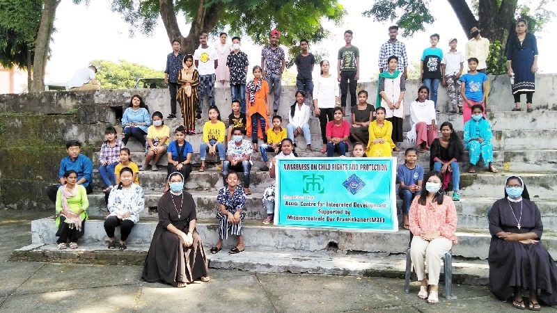Children participants with officials during the event organized by Assisi Centre for Integrated Development, Dimapur on October 10. (Photo Courtesy: ACID Dimapur)